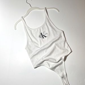 White Calvin Klein body suit. Size: Medium Condition: Worn once